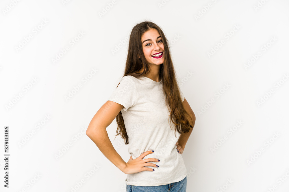 Young caucasian woman isolated on white background confident keeping hands on hips. Young caucasian woman isolated on white background confident keeping hands on hips.