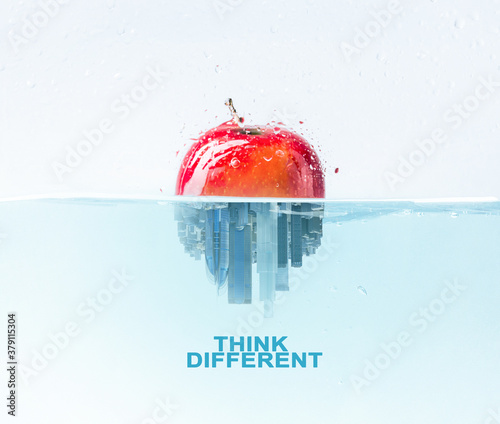 Half apple half city skyscraper under water, think different lettering