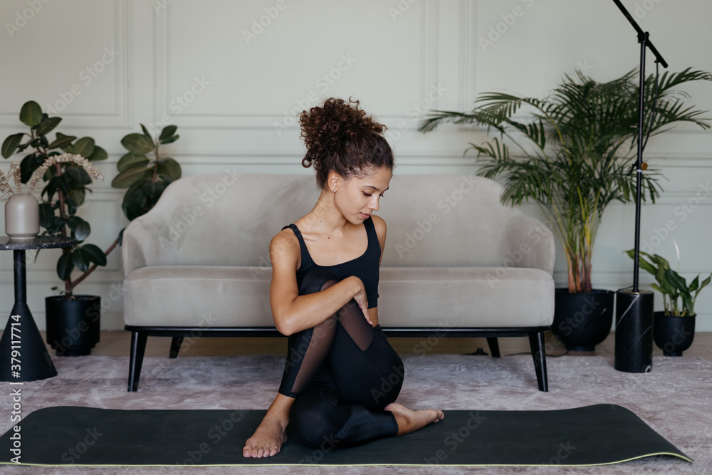 Young athletic afro american woman training at home Young athletic afro american woman training at home