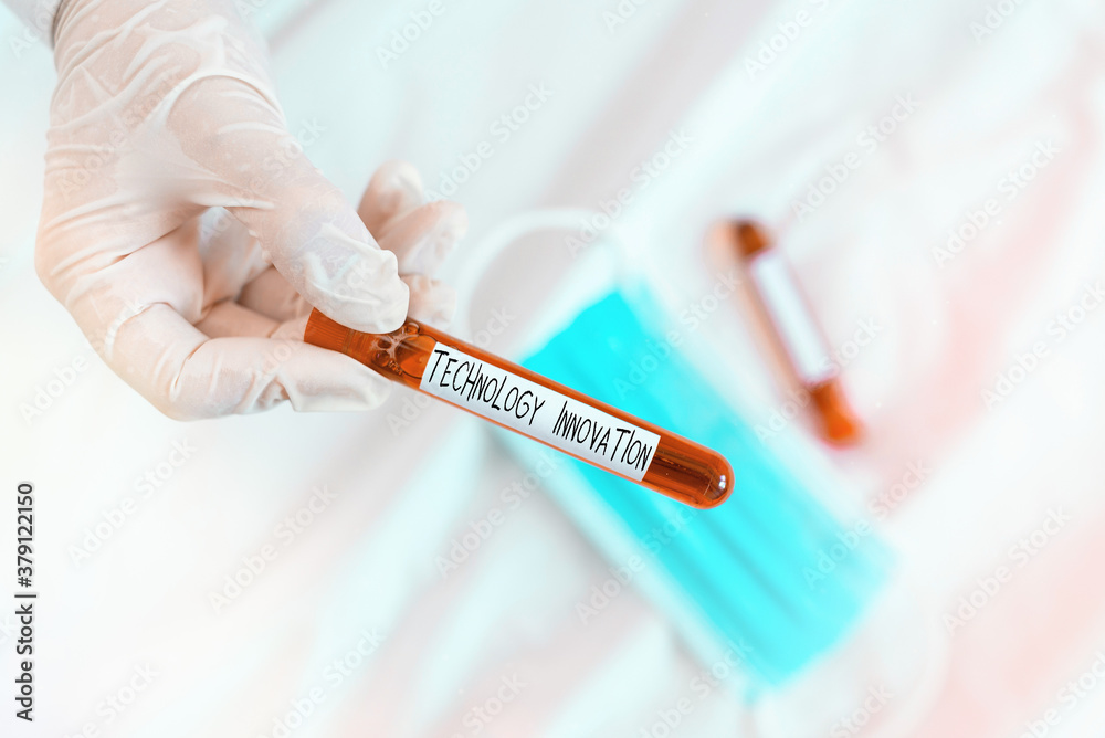 Naklejka premium Text sign showing Technology Innovation. Business photo showcasing significant technological changes of products Extracted blood sample vial ready for medical diagnostic examination