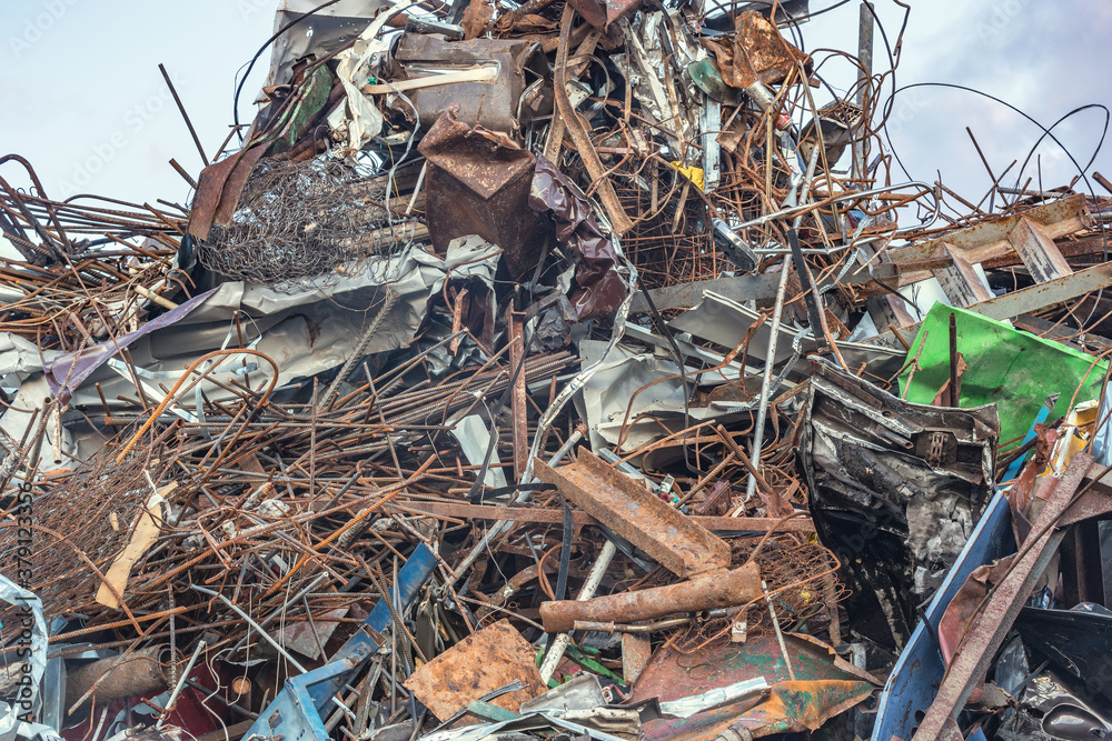 Pile of scrap metal on the garbage dump territory. Pile of scrap metal on the garbage dump territory.