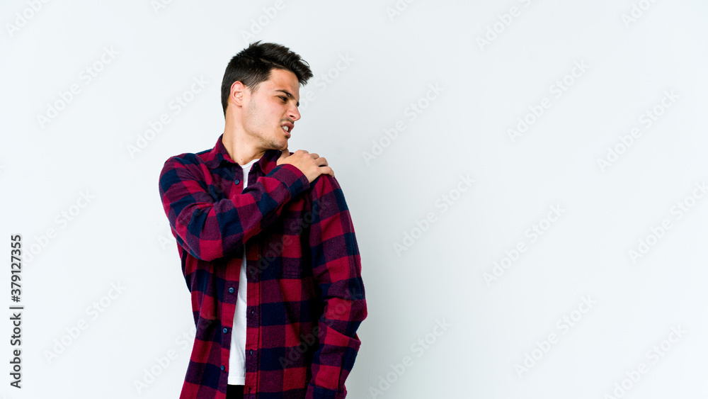 Young caucasian man isolated on white background having a shoulder pain. Young caucasian man isolated on white background having a shoulder pain.