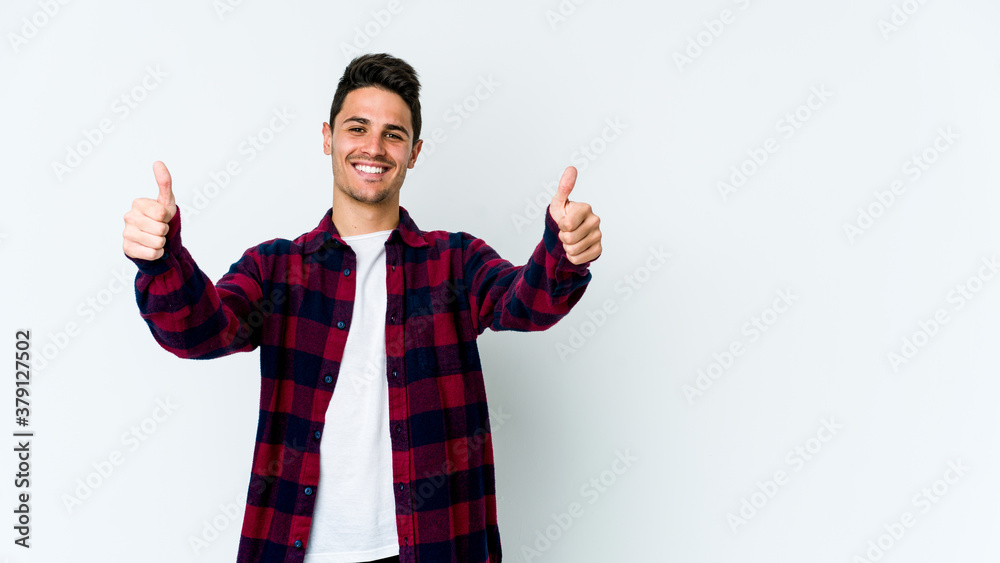 Young caucasian man isolated on white background smiling and raising thumb up Young caucasian man isolated on white background smiling and raising thumb up