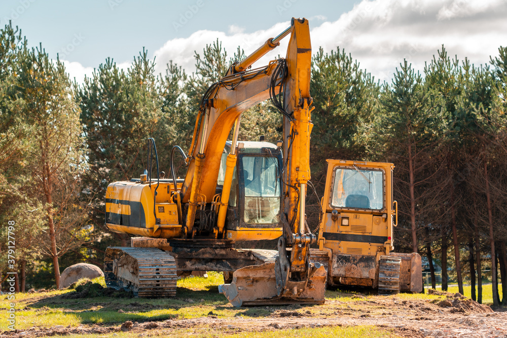 Group of industrial machinery on a construction site Group of industrial machinery on a construction site