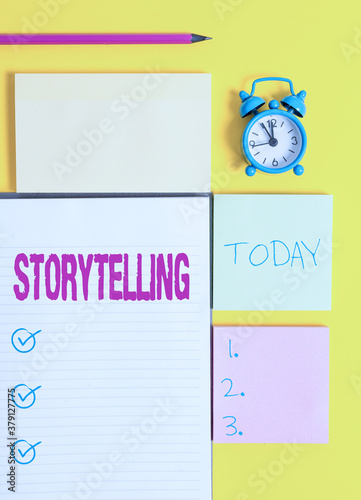 Text sign showing Storytelling. Business photo showcasing relater of anecdotes, reciter of tales, writer of stories Colored empty papers with copy space on the yellow background table photo