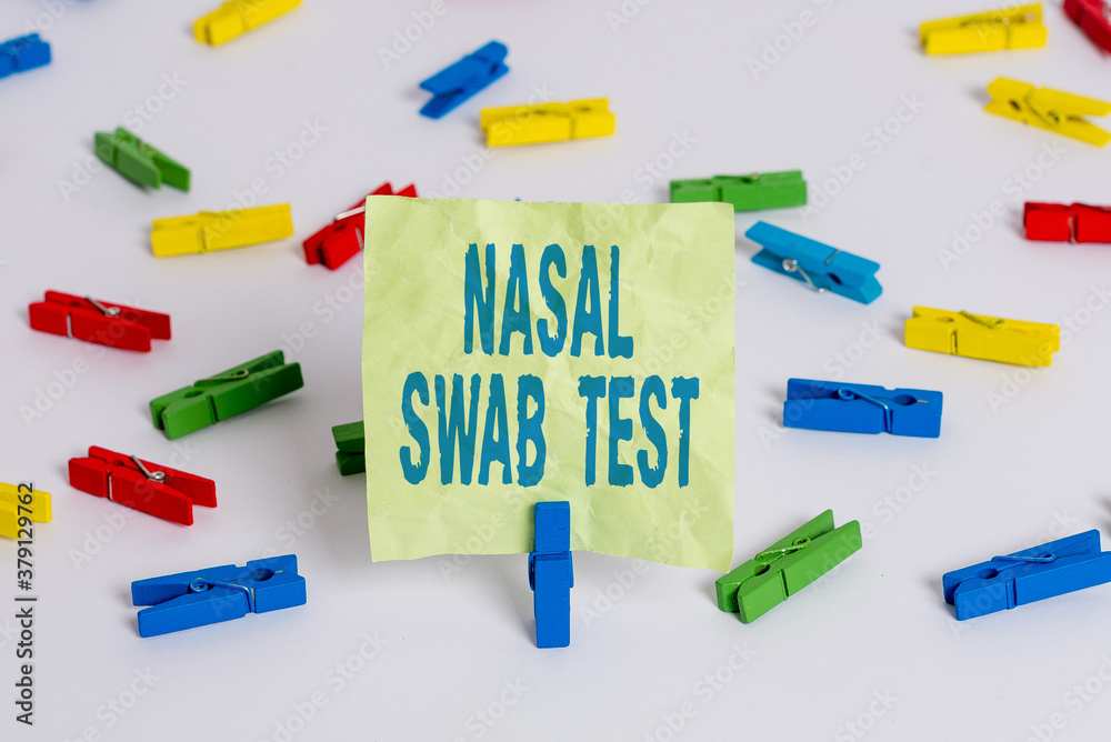 Writing note showing Nasal Swab Test. Business concept for diagnosing an upper respiratory tract infection through nasal secretion Colored clothespin papers empty reminder white floor background Writing note showing Nasal Swab Test. Business concept for diagnosing an upper respiratory tract infection through nasal secretion Colored clothespin papers empty reminder white floor background