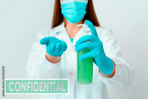Handwriting text Confidential. Conceptual photo containing an individualal information whose unauthorized disclosure Laboratory blood test sample shown for medical diagnostic analysis result photo