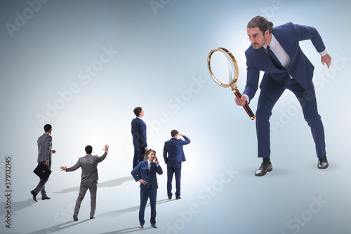 Foto Concept of employee monitoring by boss