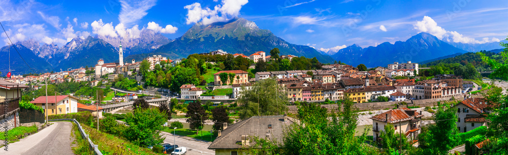 Breathtaking panorama of beautiful Belluno town surrounded by Dolomite mountains, northern Italy