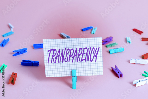 Writing note showing Transparency. Business concept for something transparent especially a picture viewed by light Colored crumpled rectangle shaped reminder paper light blue background photo