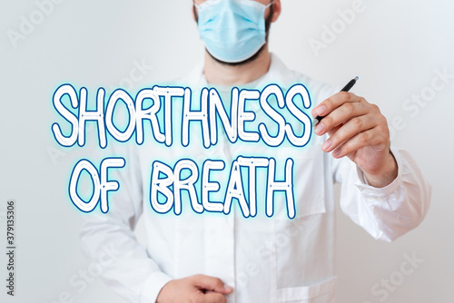 Writing note showing Shorthness Of Breath. Business concept for intense tightening of the airways causing breathing difficulty Laboratory Technician Featuring Sticker Paper Smartphone photo