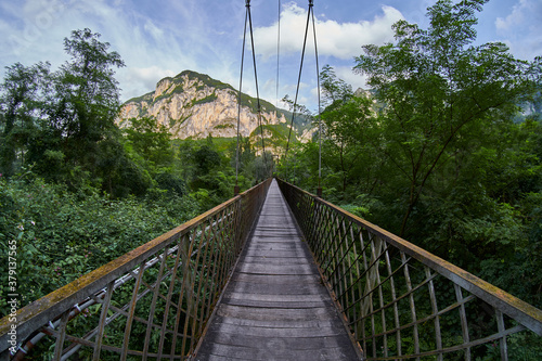 An old wooden bridge crossing Brenta River in italy 