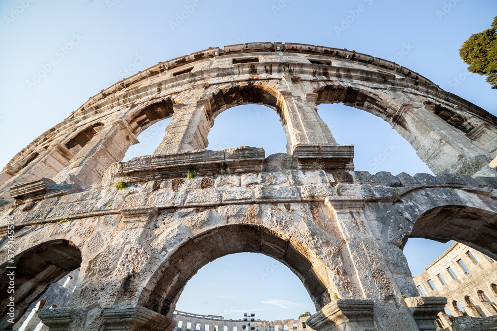 A wall fragment of ancient Roman amphitheater in Pula, Croatia