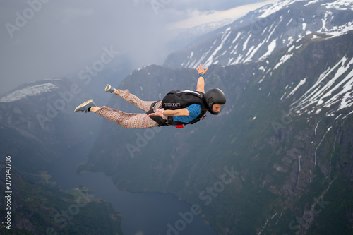 Skydivers in clouds over Norway