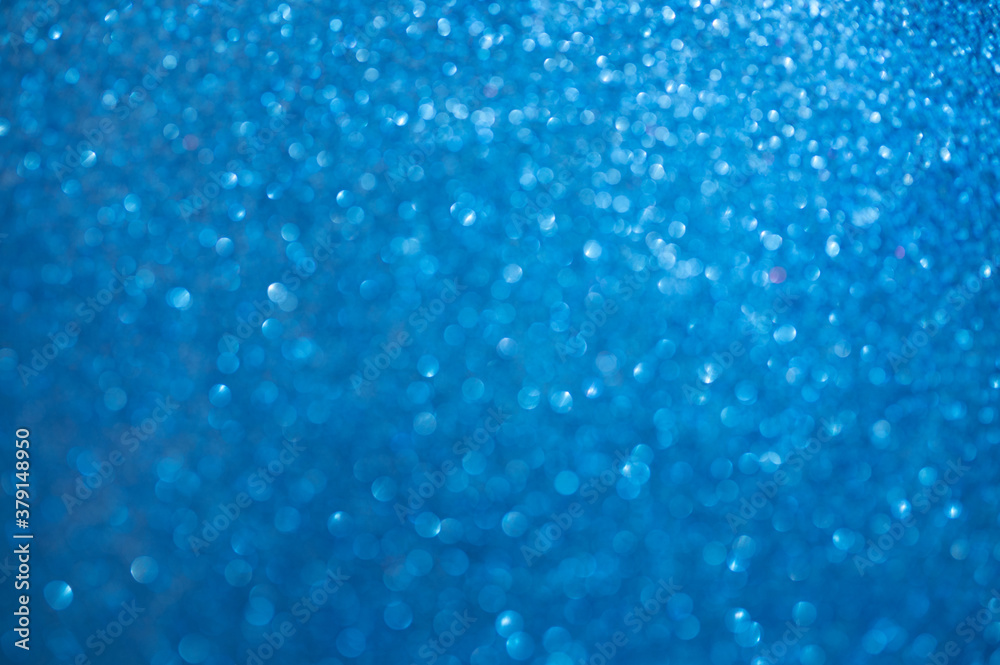 isolated background blue color with shiny bokeh holiday theme isolated background blue color with shiny bokeh holiday theme