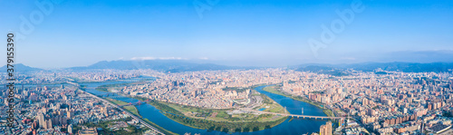 Taipei City Aerial View - Asia business concept image, panoramic modern cityscape building bird’s eye view under daytime and blue sky, shot in Taipei, Taiwan.