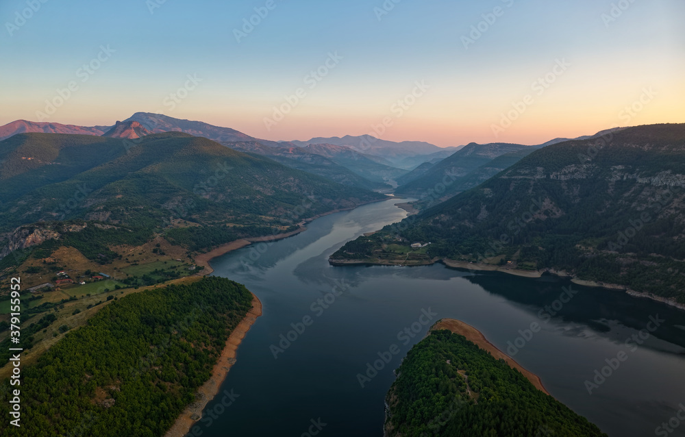 The river Arda valley in Rhodope mountains in Bulgaria during sunset. Meanders in the Lake Kardzhali or Kardjali