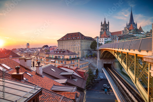 City of Lausanne. Cityscape image of downtown Lausanne, Switzerland during beautiful autumn sunset.	