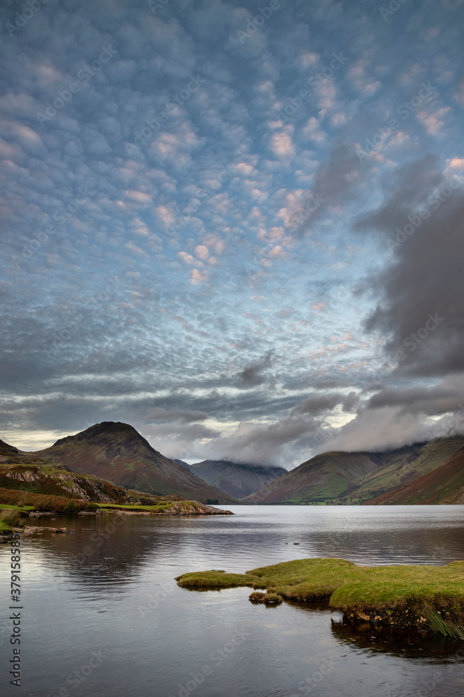 Beautiful late Summer landscape image of Wasdale Valley in Lake District, looking towards Scafell Pike, Great Gable and Kirk Fell mountain range