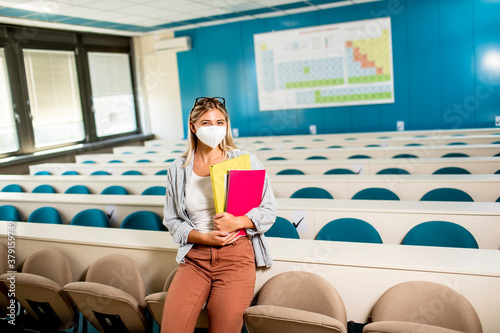 Female student wearing face...