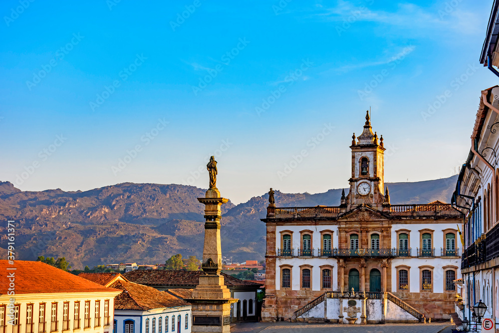 Ancient Ouro Preto central square with its historic buildings and monuments in 18th century Baroque and colonial architecture - obrazy, fototapety, plakaty 
