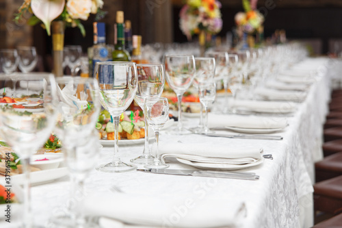 Table set for wedding or another catered event dinner. © BY-_-BY