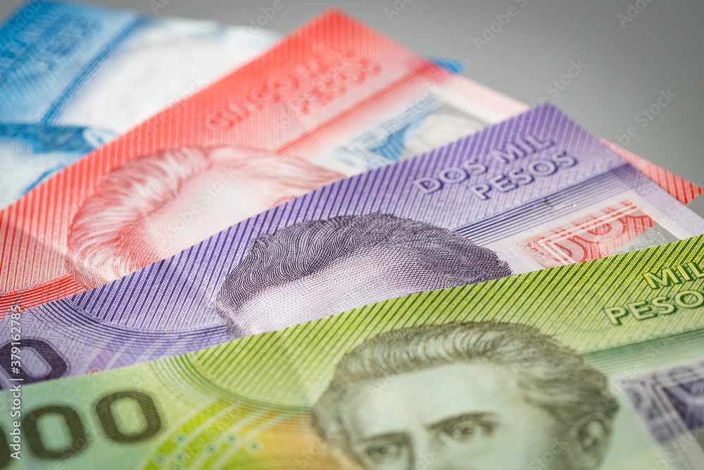 Obraz premium Chile money, Pesos, Paper notes of various values lying on the desk