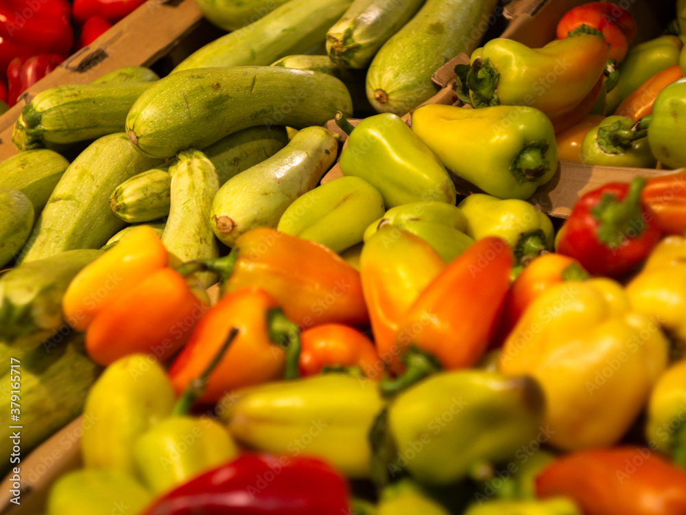 vegetables on the store counter. fresh zucchini, peppers vegetables on the store counter. fresh zucchini, peppers