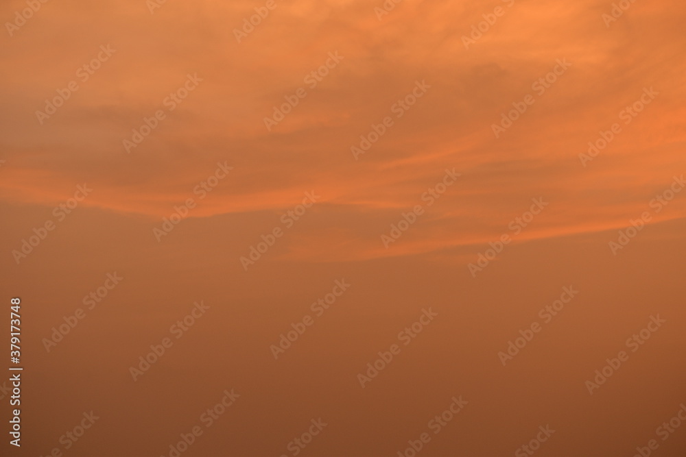 Abstract image of yellow and orange dramatic sky for background.