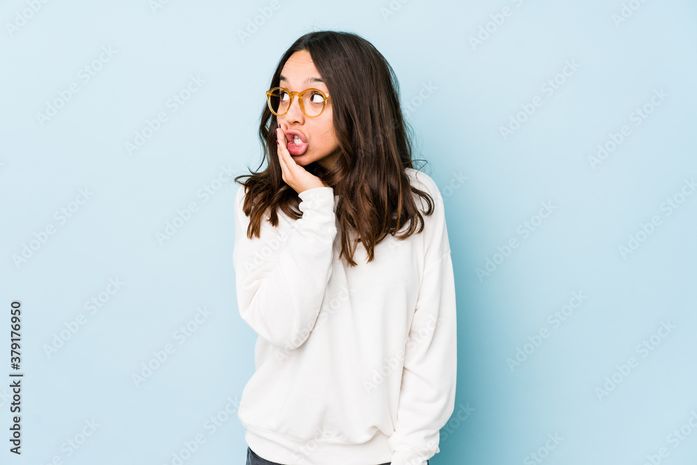 Young mixed race hispanic woman isolated is saying a secret hot braking news and looking aside Young mixed race hispanic woman isolated is saying a secret hot braking news and looking aside