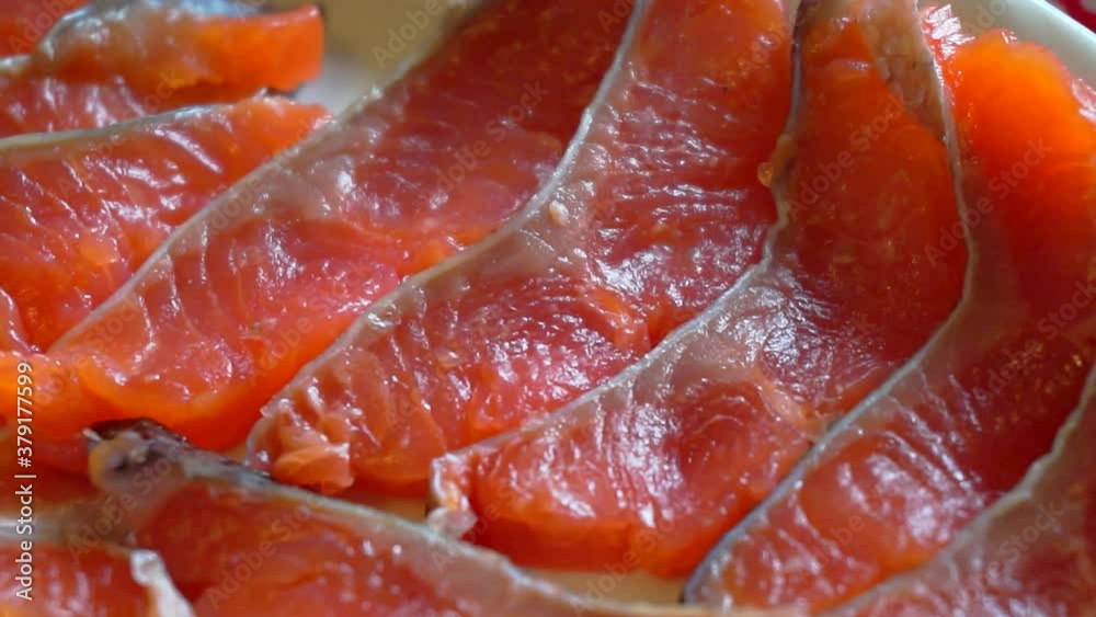 food background. slices of cooked red fish close-up food background. slices of cooked red fish close-up