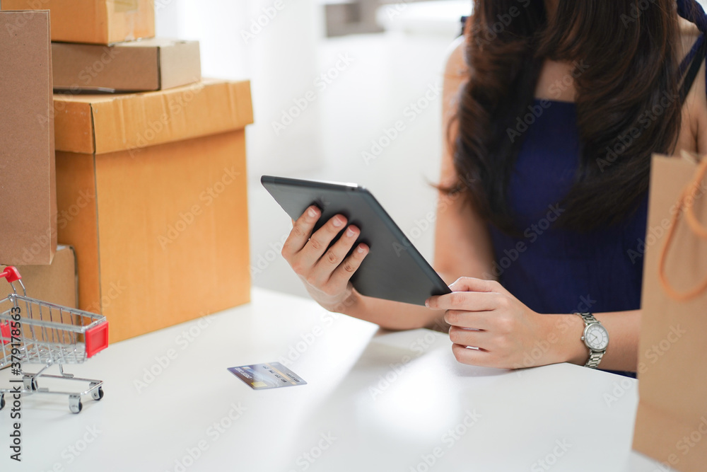 Young woman using smart phone for online shopping. Young woman using smart phone for online shopping.