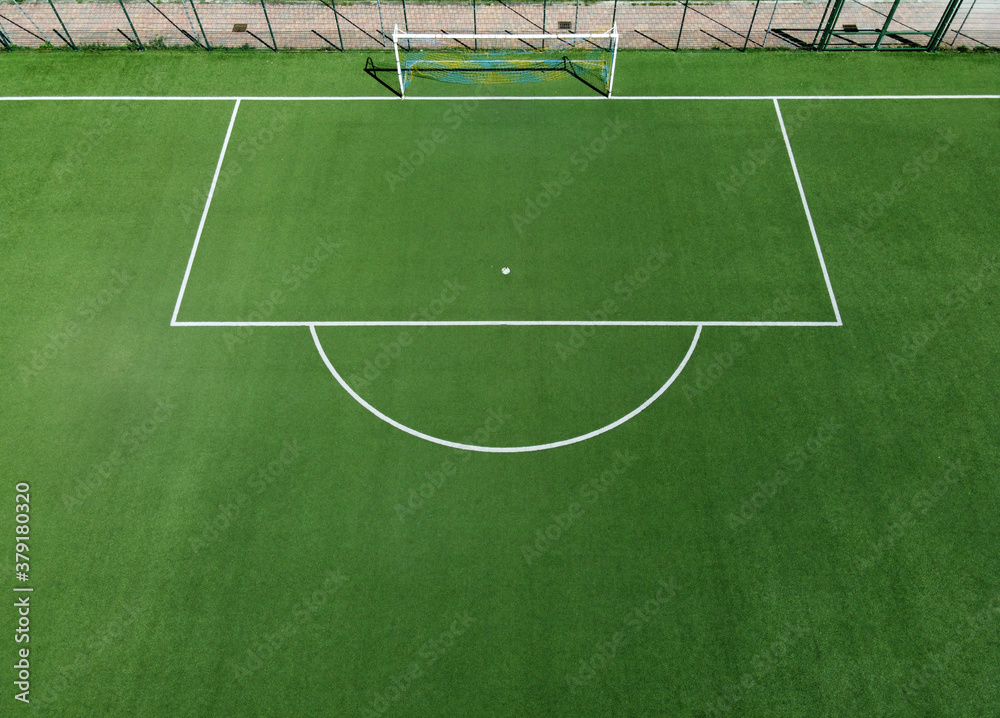 Aerial view of an empty green soccer field