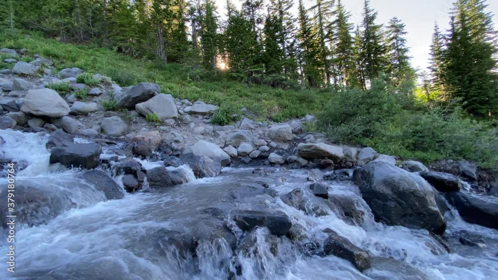 Water stream in the North Cascade mountains at sunset Water stream in the North Cascade mountains at sunset