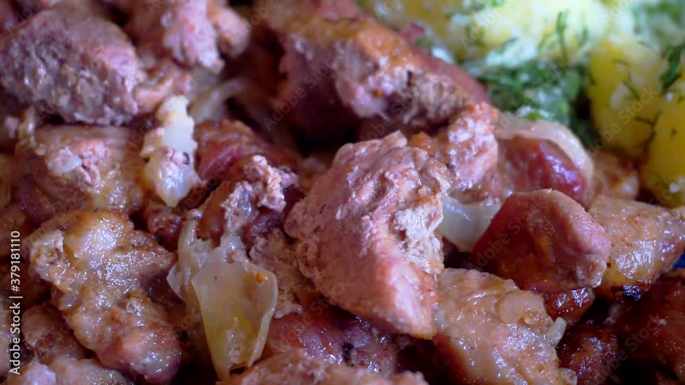 food background. rustic boiled potatoes and fried meat. close-up food background. rustic boiled potatoes and fried meat. close-up