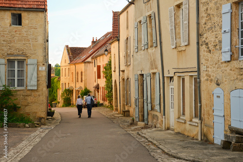 Little town in Burgundy, France.  Flavigny-sur-Ozerain is a commune in the French department of Côte-d'Or, in Bourgogne-Franche-Comté. Red roofs, stone  houses surrounded by trees. © Ondej