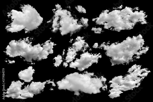 Set of isolated clouds over black.