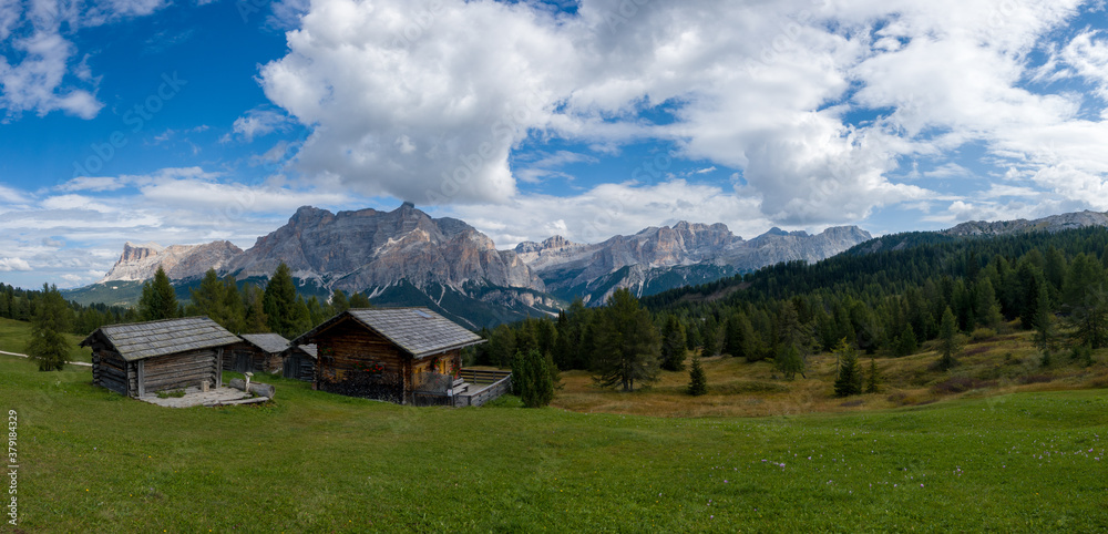 Huts in the alps - Piz de Medesc (Medesspitze) and Cima Cunturines (Cunturines-Spitze) beautiful panorama landscape of the dolomites mountains, alpes south tyrol Italy	