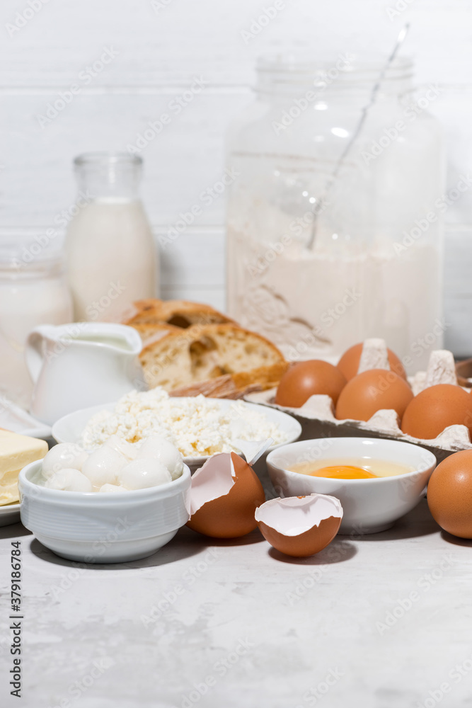 fresh farm dairy products and bread, vertical fresh farm dairy products and bread, vertical
