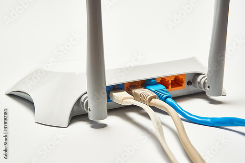 Network cable connects to wireless router, router, internet, global network.