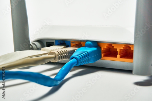 Connecting to a router, network cables connected to a router.
