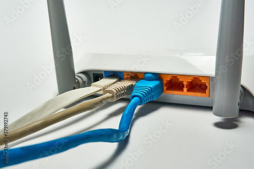 Connecting to a router, network cables connected to a router.