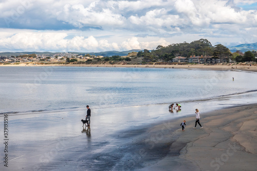 People enjoy a quiet day at Del Monte Beach, along the Monterey Bay of the central Pacific coast of California.  