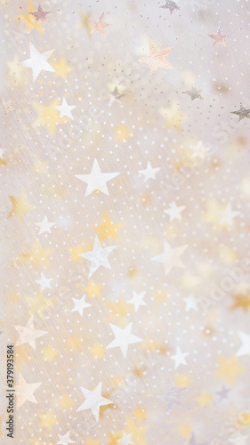 gold glitter and glittering stars on white festive background. Winter holidays background. Christmas and Happy New Year greeting card. Wedding. Birthday. selective focus