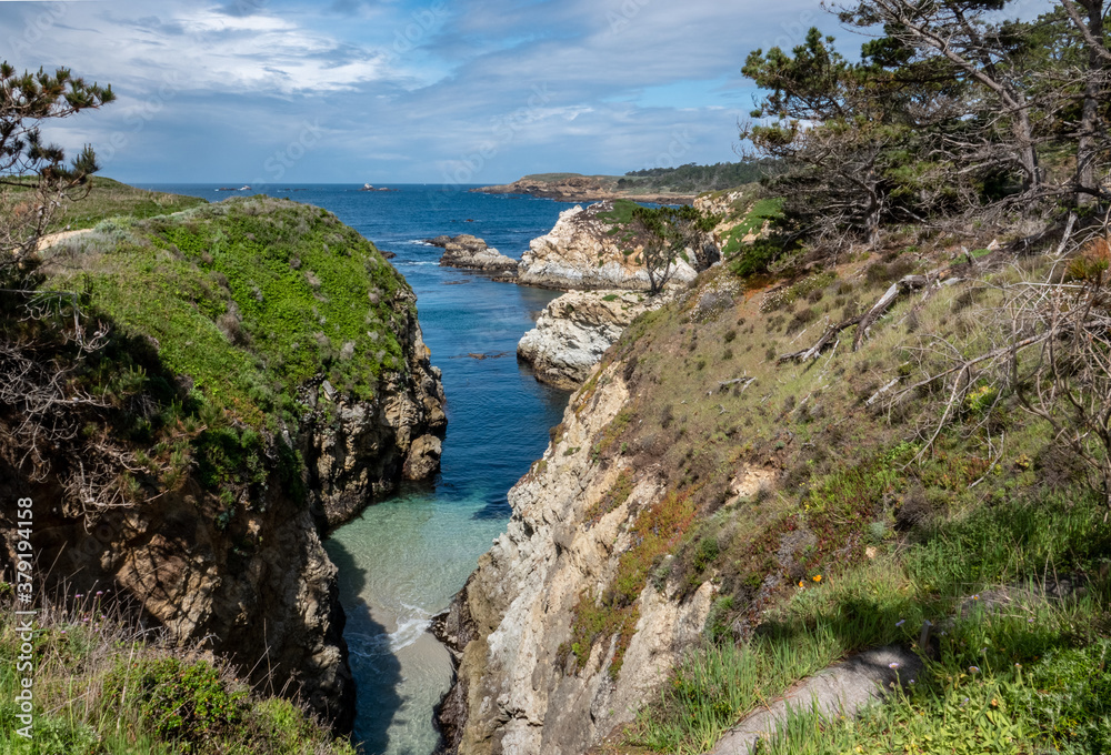 The Point Lobos State Natural Reserve, along the Monterey Bay of the central Pacific Coast of California in Carmel by the Sea, features pristine rocky coastline and trails.