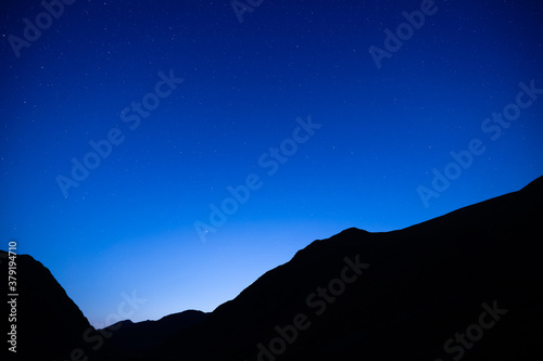 a view of the stars and milky way galaxy from glen etive in the argyll region of the highlands of scotland during a clear dark autumn night