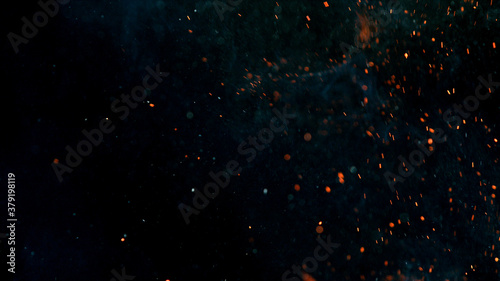 Photo Flying sparks isolated on black background, close-up