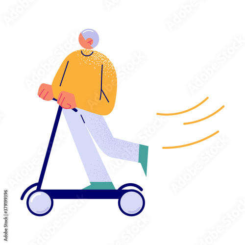 Young man enjoying riding scooter in green city