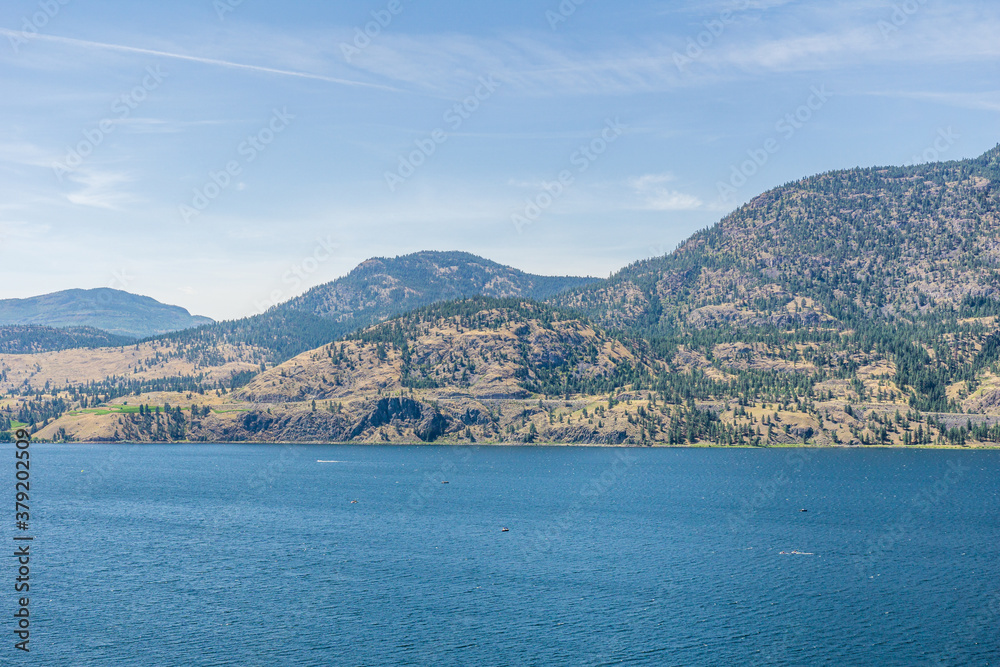Skaha lake view at summer time with blue sky british columbia canada