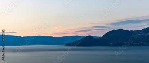 cloudy sky seen from the shore of Okanagan lake at night British Columbia Canada